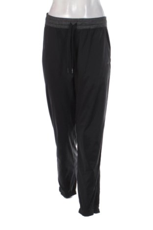 Dámske tepláky Nike, Veľkosť M, Farba Čierna, Cena  25,00 €, #137346117