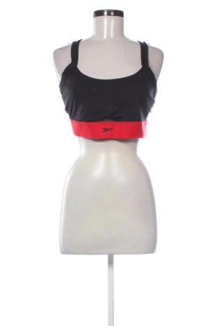 Damski sportowy top Reebok, Rozmiar M, Kolor Kolorowy, Cena 62,10 zł, #137378144