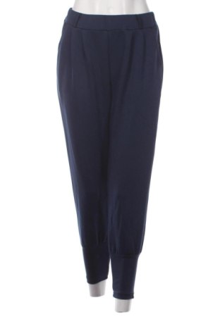 Damskie spodnie sportowe NEW COLLECTION, Rozmiar M, Kolor Niebieski, Cena 50,80 zł, #137355969