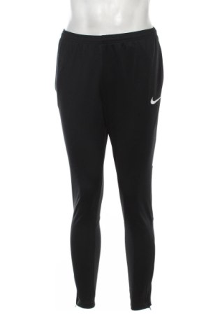 Męskie spodnie sportowe Nike, Rozmiar M, Kolor Czarny, Cena 135,50 zł, #137345959