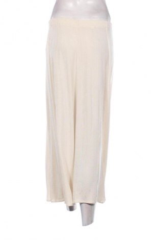 Szoknya Unbranded, Méret M, Szín Ekrü
, Ár 3 200 Ft