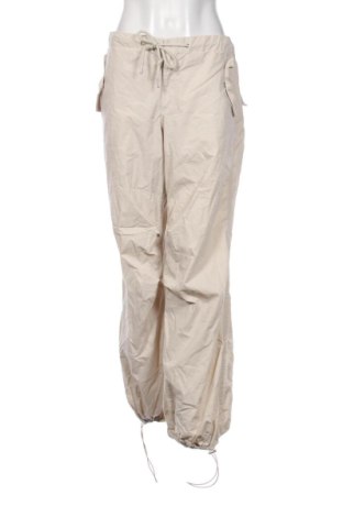 Damskie spodnie Bershka, Rozmiar L, Kolor Beżowy, Cena 50,80 zł, #137401106