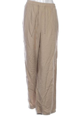 Damskie spodnie H&M, Rozmiar L, Kolor Beżowy, Cena 76,20 zł, #137442377