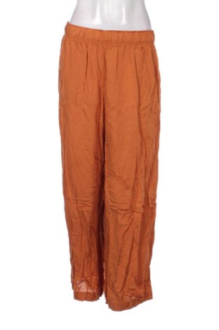 Damskie spodnie H&M, Rozmiar L, Kolor Pomarańczowy, Cena 50,80 zł, #137422551