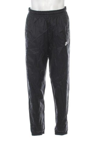 Męskie spodnie sportowe Nike, Rozmiar M, Kolor Czarny, Cena 135,47 zł, #137249159
