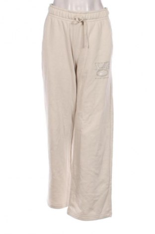 Dámské kalhoty  Nike, Velikost S, Barva Béžová, Cena  1 849,00 Kč