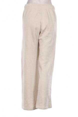 Dámské kalhoty  Nike, Velikost S, Barva Béžová, Cena  1 849,00 Kč