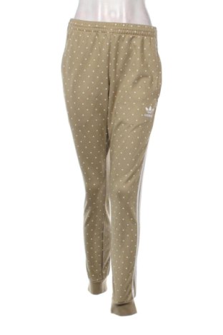 Damskie spodnie Adidas, Rozmiar L, Kolor Beżowy, Cena 42,34 zł, #137453121