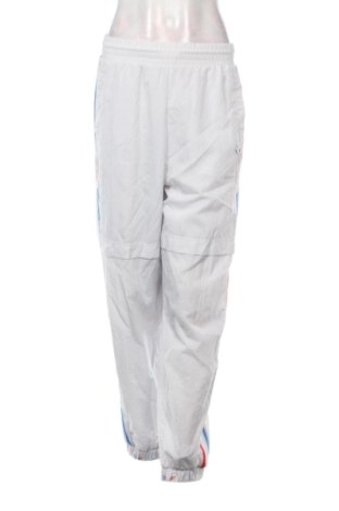 Damskie spodnie sportowe Adidas, Rozmiar M, Kolor Biały, Cena 63,50 zł, #137453197