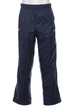 Męskie spodnie sportowe Nike, Rozmiar M, Kolor Niebieski, Cena 131,23 zł, #137261178