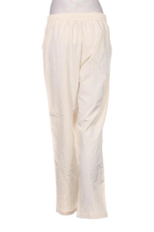 Női nadrág Unbranded, Méret L, Szín Ekrü
, Ár 2 049 Ft