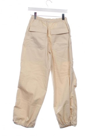 Dziecięce spodnie H&M, Rozmiar 14-15y/ 168-170 cm, Kolor Beżowy, Cena 67,24 zł