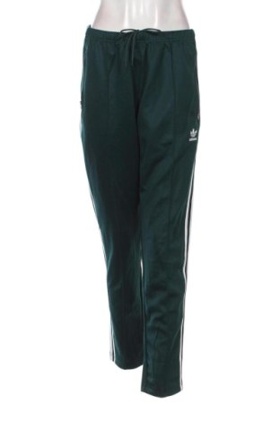 Дамско спортно долнище Adidas, Размер M, Цвят Зелен, Цена 46,00 €, #137515083