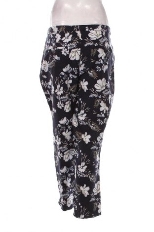 Damskie spodnie Infinity Woman, Rozmiar L, Kolor Kolorowy, Cena 22,47 zł