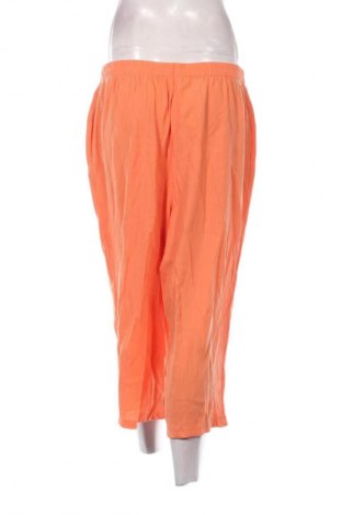 Damskie spodnie Infinity Woman, Rozmiar XL, Kolor Pomarańczowy, Cena 22,47 zł