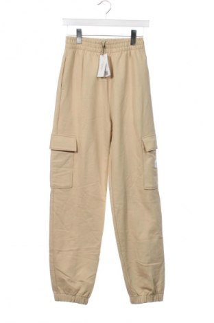 Dámské tepláky Calvin Klein Jeans, Velikost S, Barva Béžová, Cena  1 499,00 Kč