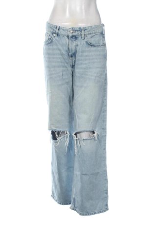Damskie jeansy H&M, Rozmiar L, Kolor Niebieski, Cena 59,27 zł, #137579412