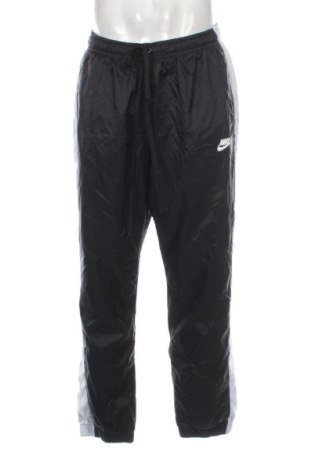 Męskie spodnie sportowe Nike, Rozmiar L, Kolor Czarny, Cena 135,47 zł, #137587741