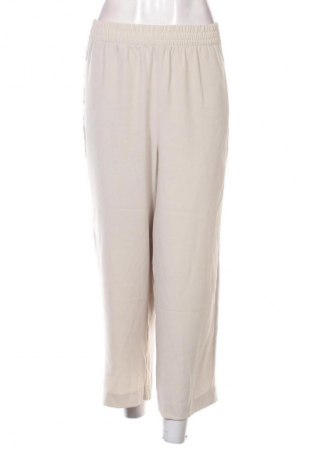 Damskie spodnie H&M, Rozmiar L, Kolor ecru, Cena 24,99 zł