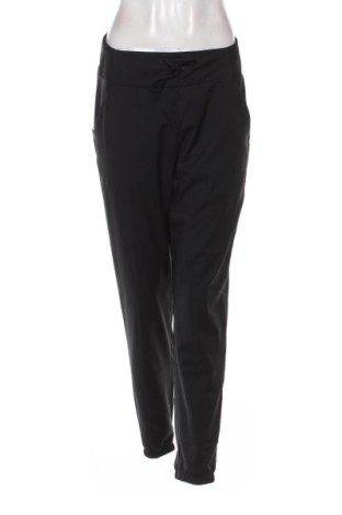 Damskie spodnie sportowe Decathlon, Rozmiar M, Kolor Czarny, Cena 42,34 zł, #137652583