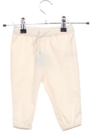 Dziecięce spodnie C&A, Rozmiar 3-6m/ 62-68 cm, Kolor ecru, Cena 54,04 zł, #137646340