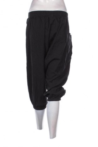 Damskie spodnie Unbranded, Rozmiar L, Kolor Czarny, Cena 25,04 zł