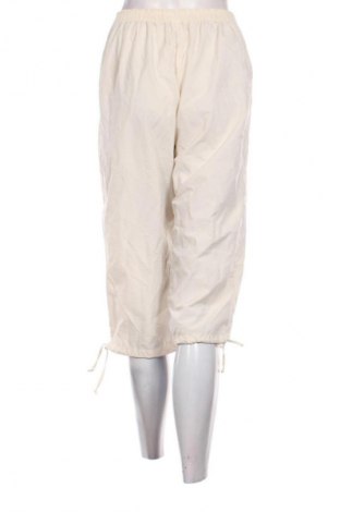 Damskie spodnie Unbranded, Rozmiar M, Kolor ecru, Cena 25,99 zł