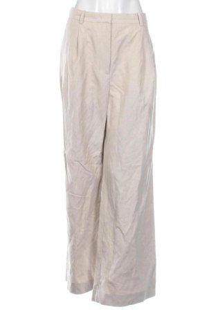 Pantaloni de femei Tommy Hilfiger, Mărime L, Culoare Bej, Preț 248,99 Lei, #137651333
