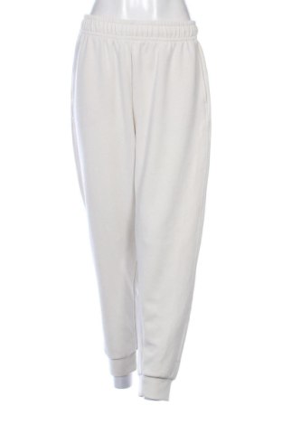 Damskie spodnie sportowe Oysho, Rozmiar L, Kolor ecru, Cena 93,14 zł, #137665394