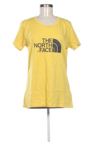 Γυναικείο t-shirt The North Face, Μέγεθος XL, Χρώμα Κίτρινο, Τιμή 24,00 €, #137722583