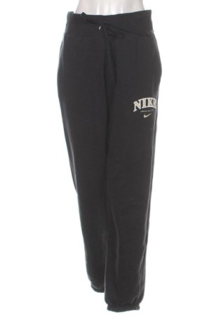Γυναικείο αθλητικό παντελόνι Nike, Μέγεθος S, Χρώμα Μαύρο, Τιμή 48,39 €, #137720019
