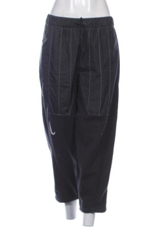 Pantaloni trening de femei Nike, Mărime L, Culoare Negru, Preț 204,03 Lei, #137731233