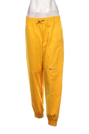Dámské kalhoty  Nike, Velikost L, Barva Žlutá, Cena  1 725,00 Kč, #137772574