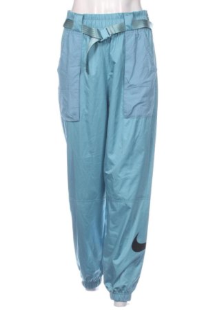 Pantaloni trening de femei Nike, Mărime L, Culoare Albastru, Preț 293,95 Lei, #137773301