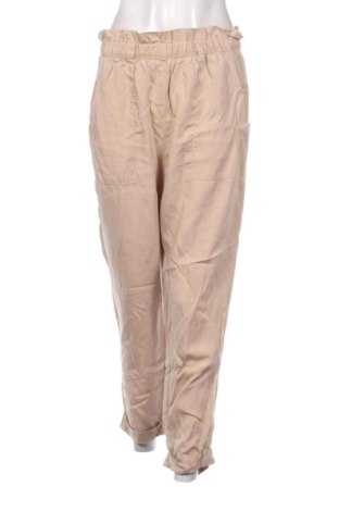 Damskie spodnie H&M, Rozmiar L, Kolor Beżowy, Cena 63,50 zł, #137789352