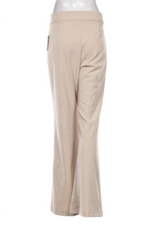 Pantaloni de femei DKNY, Mărime M, Culoare Bej, Preț 649,99 Lei