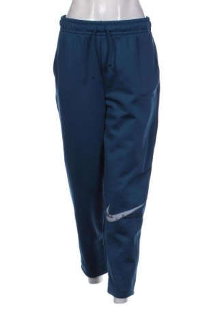 Dámské tepláky Nike, Velikost M, Barva Modrá, Cena  1 395,00 Kč