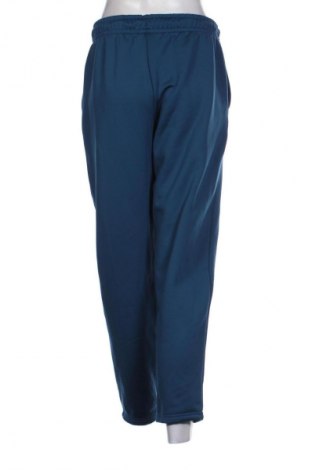 Dámské tepláky Nike, Velikost M, Barva Modrá, Cena  1 395,00 Kč