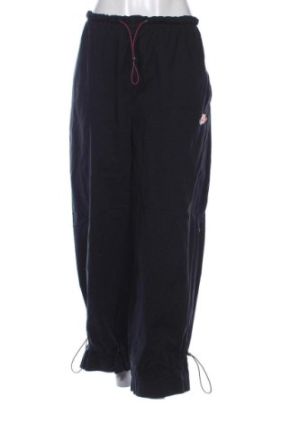 Pantaloni trening de femei Nike, Mărime XL, Culoare Negru, Preț 114,99 Lei, #137846342