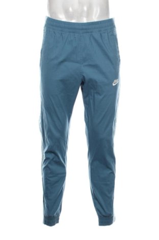 Męskie spodnie sportowe Nike, Rozmiar M, Kolor Niebieski, Cena 105,84 zł, #137879023
