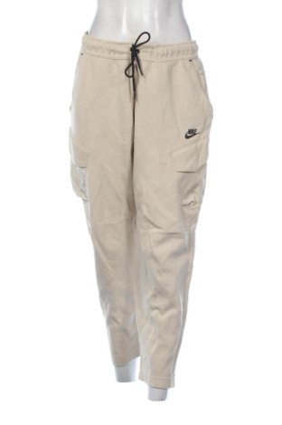 Pantaloni trening de femei Nike, Mărime L, Culoare Bej, Preț 172,99 Lei, #137880883