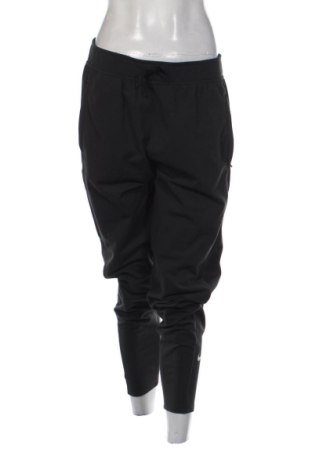 Dámské tepláky Nike, Velikost L, Barva Černá, Cena  728,00 Kč, #137907828