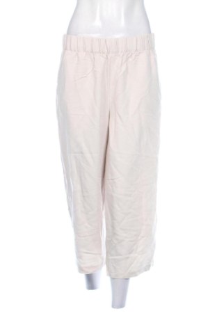 Damskie spodnie H&M, Rozmiar L, Kolor ecru, Cena 53,23 zł, #137948536