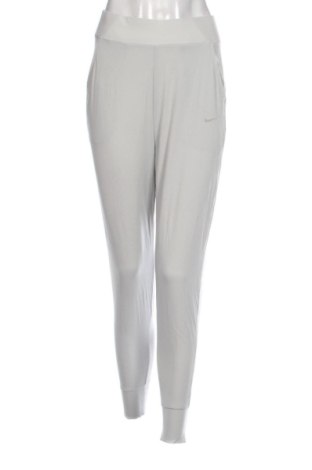 Damskie spodnie sportowe Nike, Rozmiar S, Kolor Beżowy, Cena 152,41 zł, #137939183
