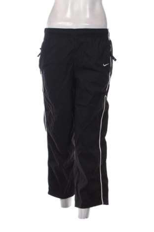 Damskie spodnie sportowe Nike, Rozmiar S, Kolor Czarny, Cena 143,94 zł, #137957535