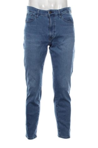 Męskie jeansy Uniqlo, Rozmiar L, Kolor Niebieski, Cena 76,20 zł, #137963347