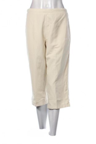 Dámské tepláky Reebok, Velikost M, Barva Žlutá, Cena  179,00 Kč