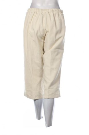 Dámské tepláky Reebok, Velikost M, Barva Žlutá, Cena  179,00 Kč