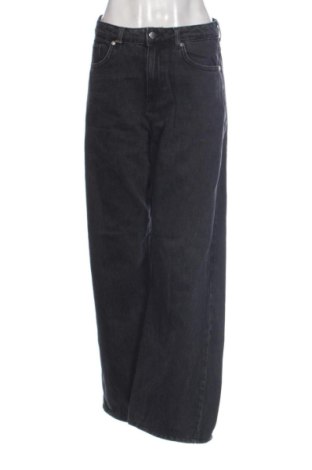Damskie jeansy United Colors Of Benetton, Rozmiar M, Kolor Czarny, Cena 88,90 zł, #138021164