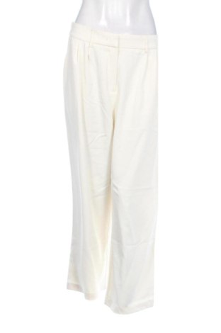Damskie spodnie Unbranded, Rozmiar L, Kolor ecru, Cena 33,87 zł, #137995107